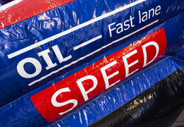 Encomende o castelo insuflável para crianças com escorregador na fórmula 1 tema. Castelos insufláveis com escorregador à venda na JB Insufláveis ​​Portugal