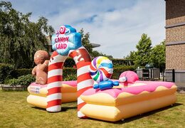 Opblaasbaar open bubble boarding park springkussen met schuim kopen in thema candyland snoep lollipop voor kinderen