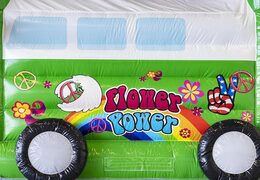 Encomende o castelo inflável inflável padrão com teto em tema hippie verde para crianças