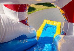 Almofada de ar inflável com seção de salto e slide de tema de pato de borracha para venda para crianças