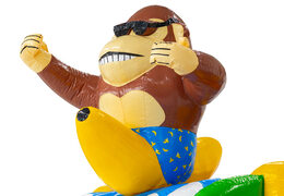 Figura 3D no castelo inflável Dubbelslide macaco com tema de praia e banana.