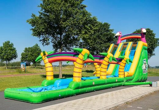 Compre o castelo insuflável Drop & Slide Jungle com escorregador duplo para crianças. Encomende castelos insufláveis ​​online na JB Insufláveis Portugal