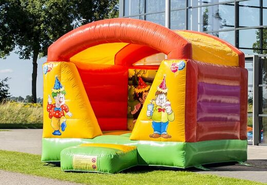 Castelo insuflável com mini-telhado com tema de festa para as crianças comprarem. Encomende castelos insufláveis ​​agora na JB Inflatables UK JB Insufláveis ​​Portugal online