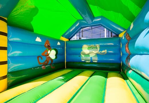 Compre um castelo insuflável da selva padrão em cores marcantes com um grande objeto gorila 3D no topo, para as crianças. Compre castelos insufláveis ​​online na JB Insufláveis ​​Portugal