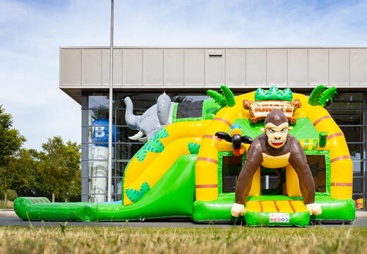 Encomende o segurança multi super inflável com slide no tema da selva verde amarelo para crianças