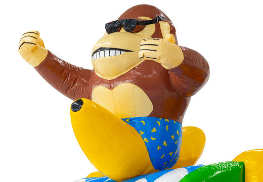 Figura 3D no castelo inflável Dubbelslide macaco com tema de praia e banana.